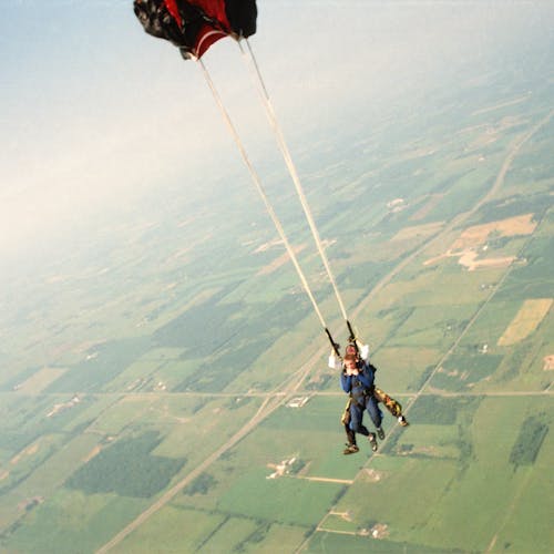 People Parachuting over Plains