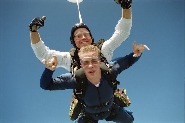 Two Skydivers In Clear Sky