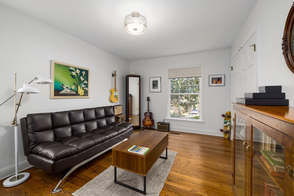 Leather Couch on Wooden Floor