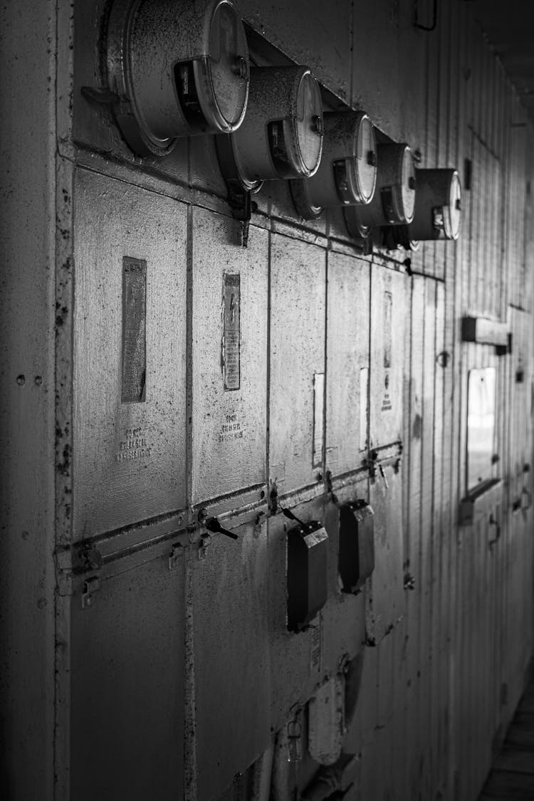 A Wall With Meters In A Factory