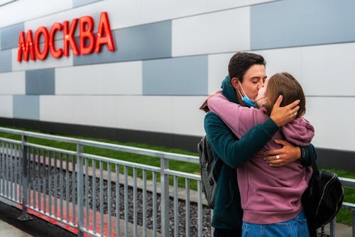Young Couple Kissing on a Train Station in Moscow 