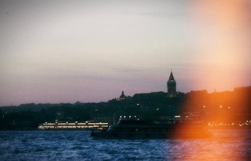 Ferry on Sea and Galata Tower behind