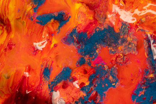 Free Dynamic abstract artwork featuring vivid blues, reds, and yellows for a striking visual impact. Stock Photo