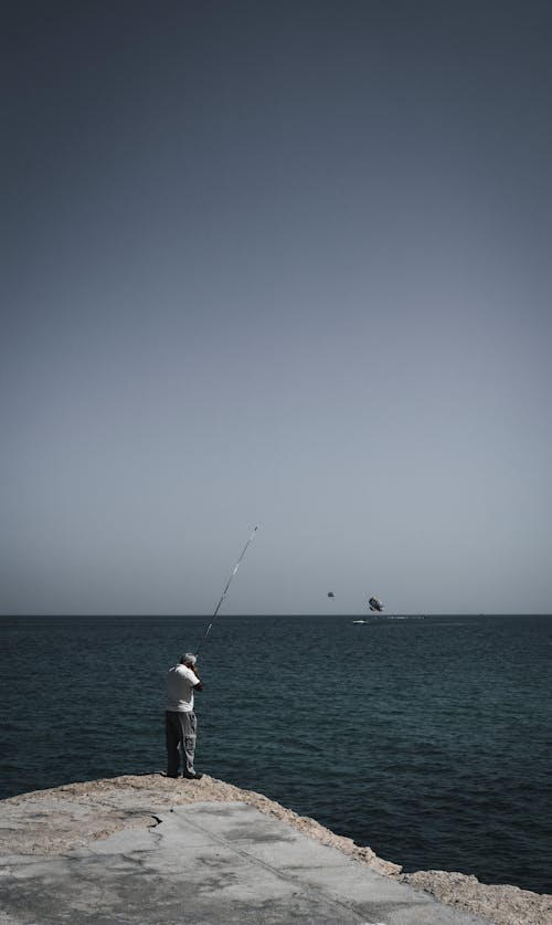 Základová fotografie zdarma na téma koníček, moře, muž