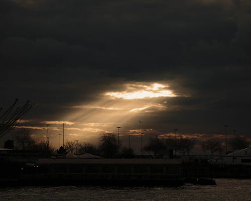 Photos gratuites de ciel crépusculaire, flash de lumière