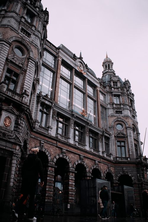 Free Striking facade of Antwerp Central Station in Belgium, a blend of historical and modern architecture. Stock Photo