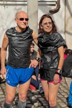 Elderly couple wearing makeshift workout gear outdoors in Paris.