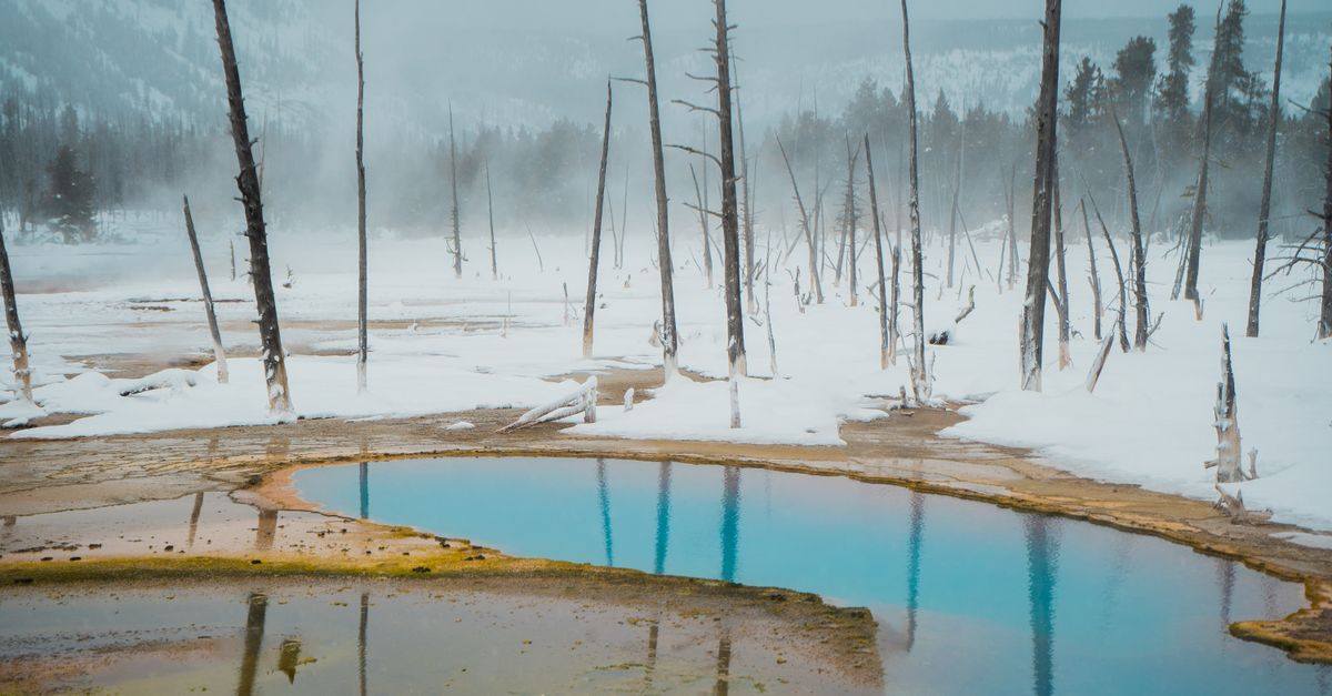 Wyoming mountain hot springs steam cold winter air
