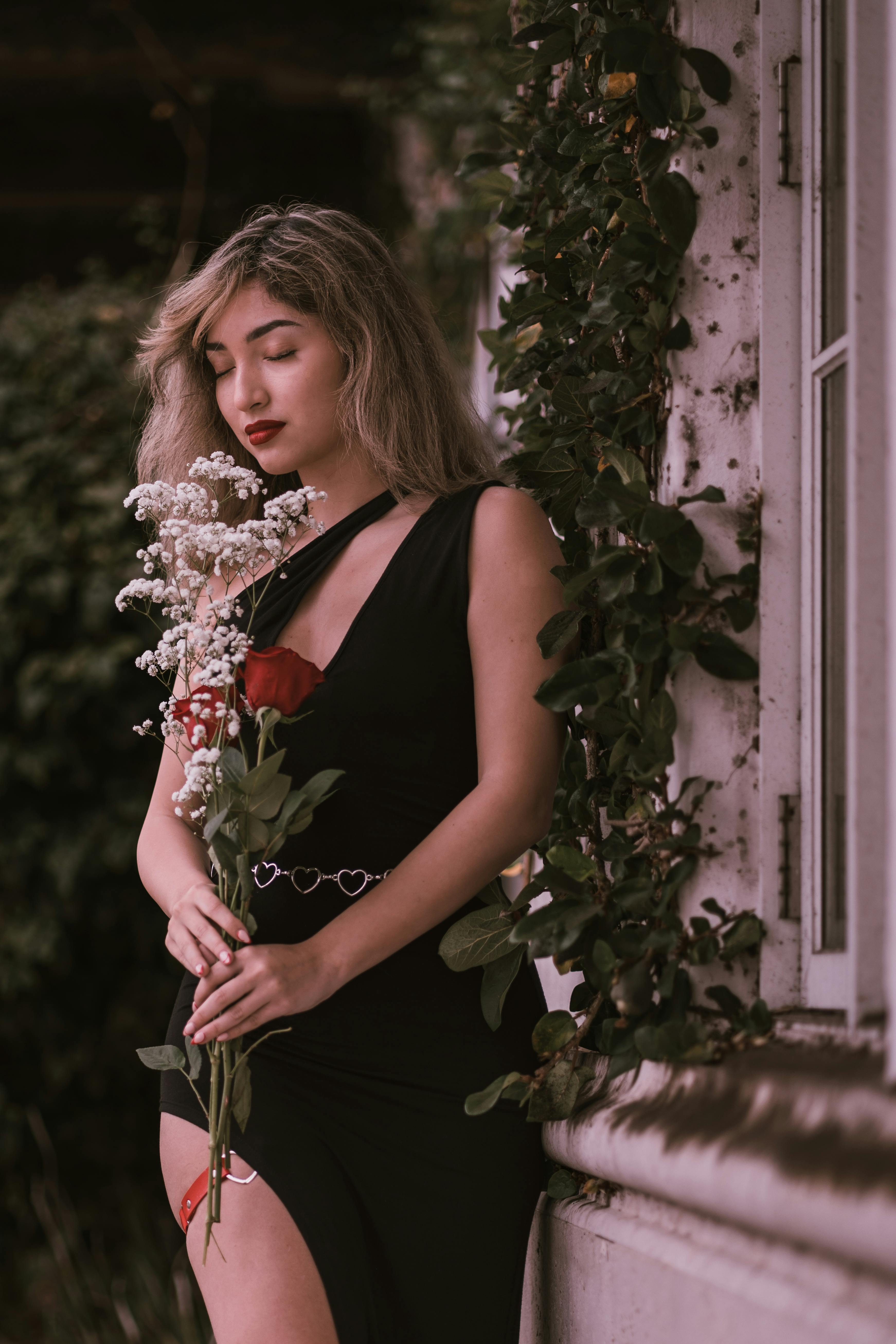 Woman in Black Dress with Flowers Free Stock Photo Woman in Black Dress with Flowers Free Stock Photo