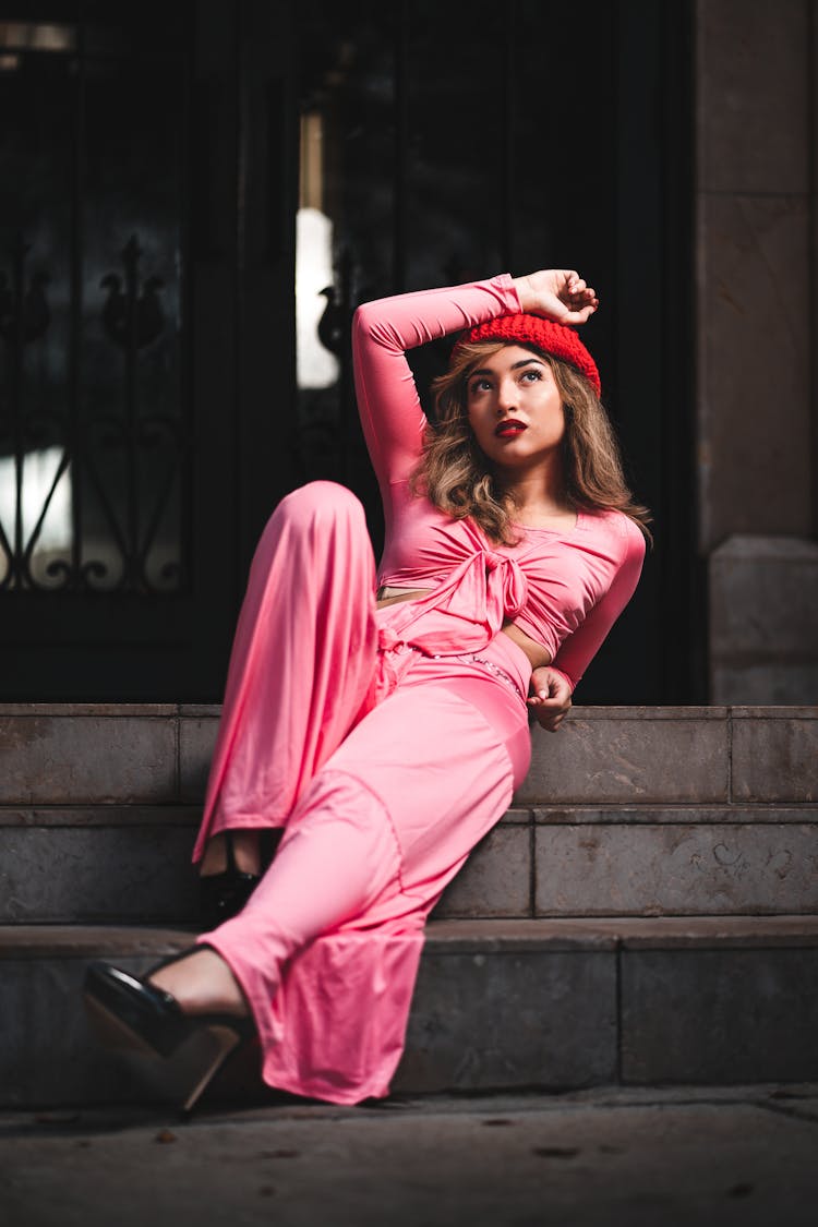 Woman In Pink Cloths On Stairs