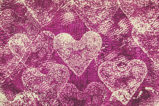 Patterned hearts on a textured purple background, ideal for Valentine's themes
