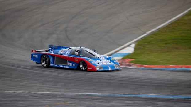 Blue Race Car on the Track