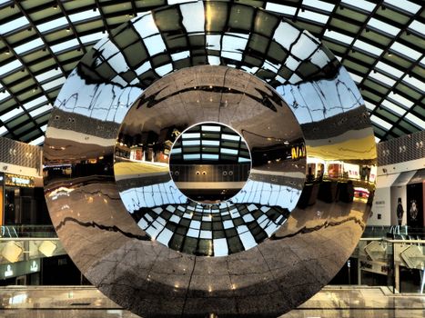 Concentric Mirror in a Shopping Mall
