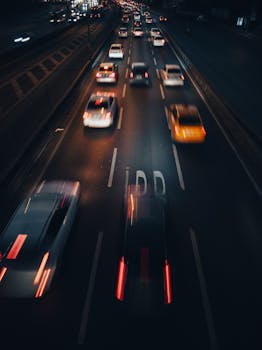Dynamic long exposure of nighttime traffic on a bustling Istanbul road.