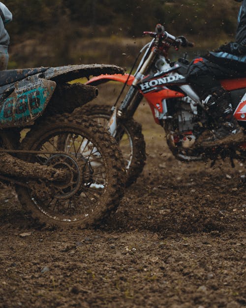 Free Red and Black Dirt Motorcycle on Dirt Road Stock Photo