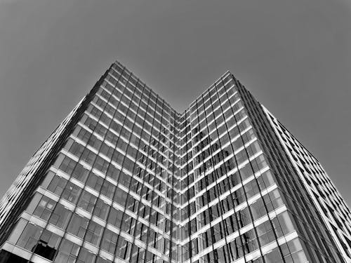 A Grayscale Photo of a High Rise Building
