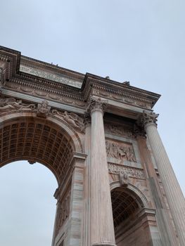 Low angle view of Arco della Pace, Milan's historic neoclassical arch.