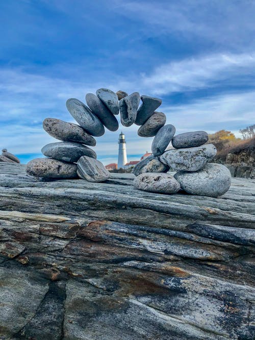Безкоштовне стокове фото на тему «баланс, балансування каміння, берег моря»