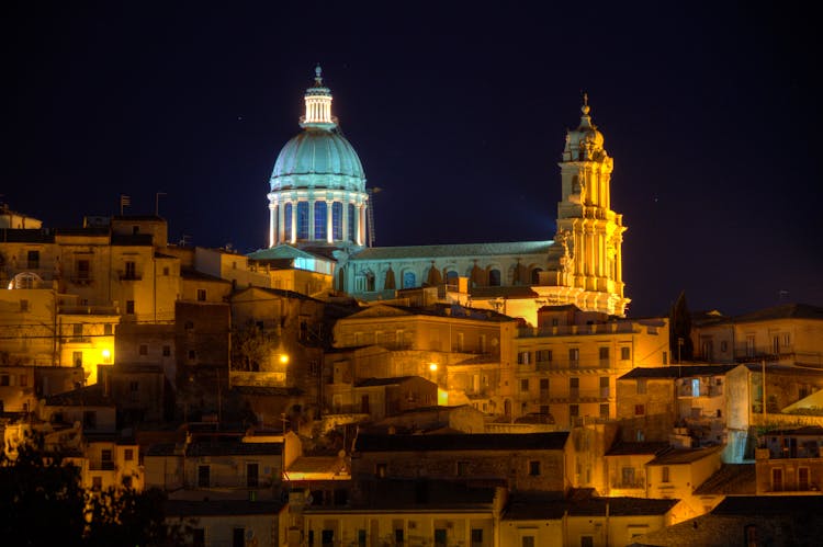 Historic Ancient Baroque Cathedral Behind Buildings