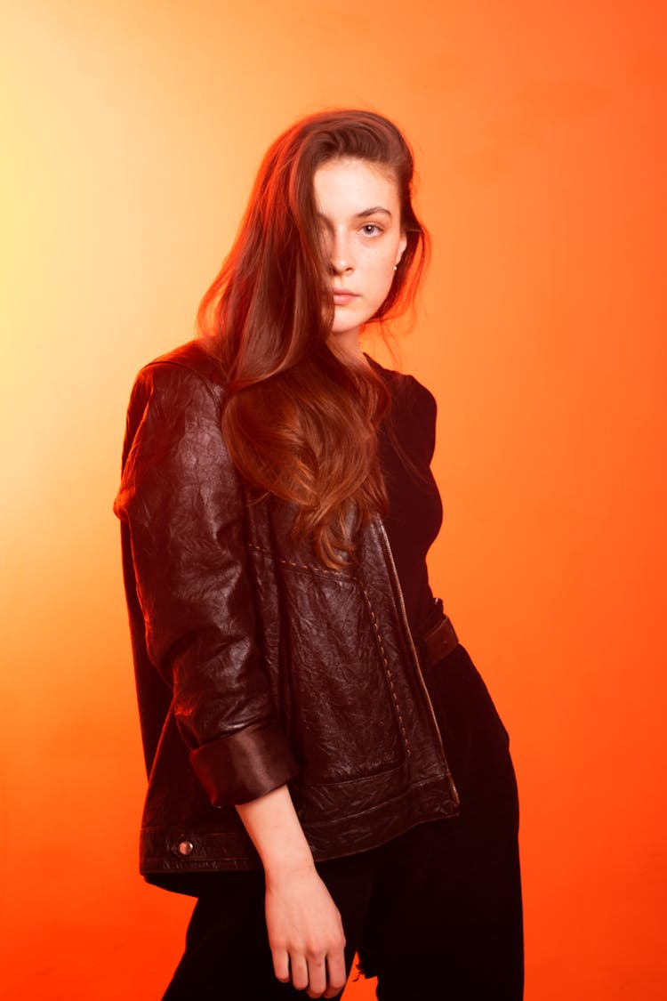 Woman Wearing Black Leather Jacket And Pants 