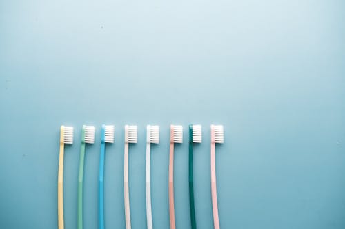 Free Toothbrushes in Various Colors Stock Photo