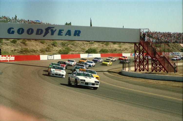 Race Cars Racing In A Tract