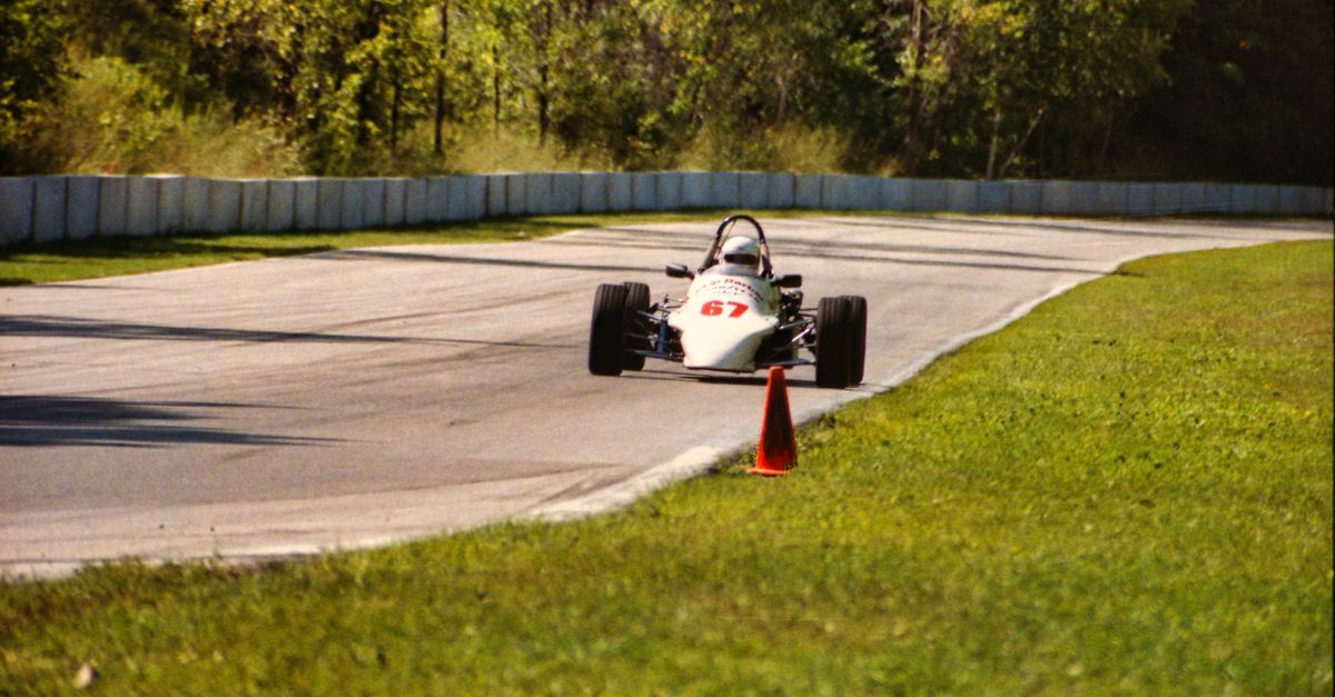 White Racetrack White Race Car on Track ยท Free Stock Photo