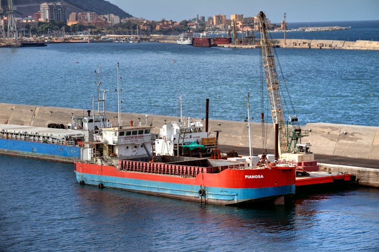 Red And Blue Ship On The Port