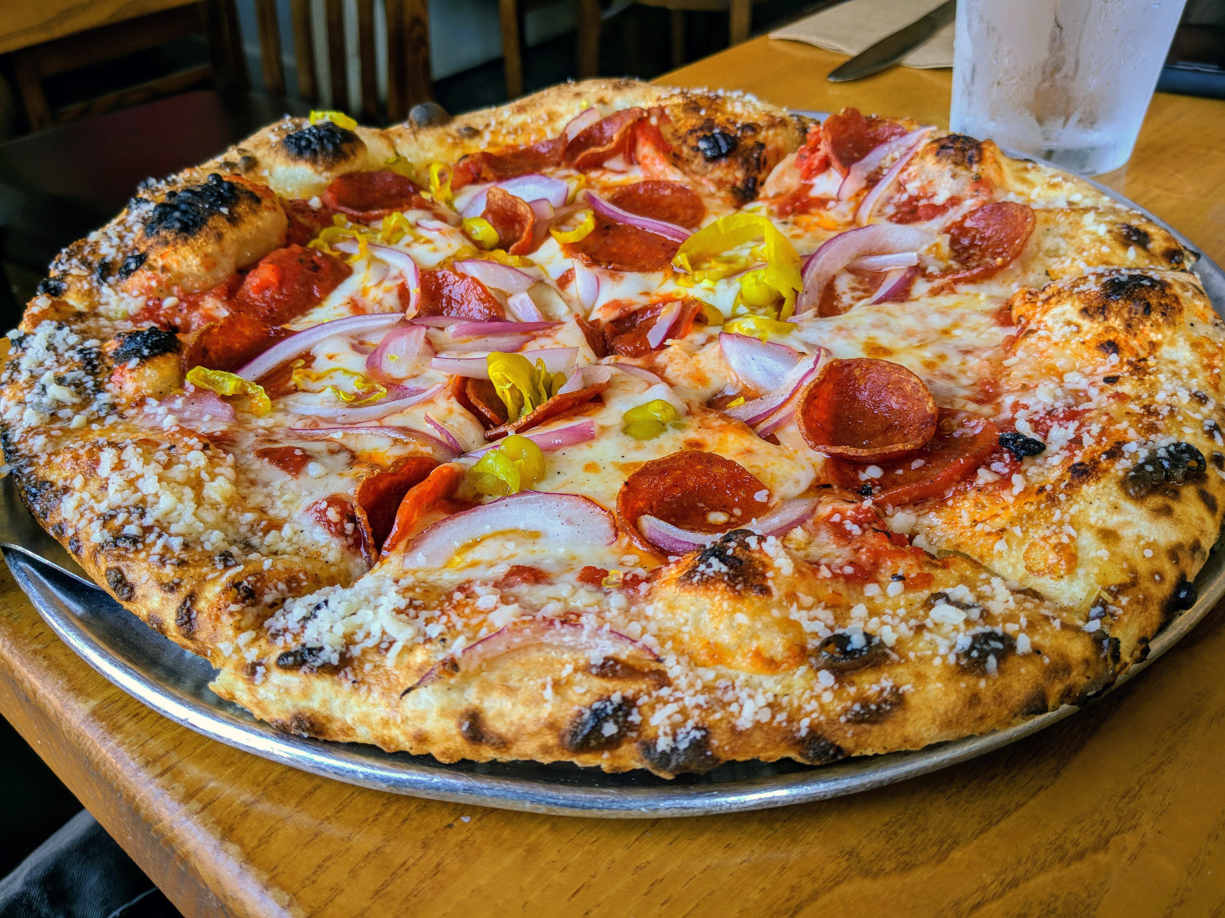 Classic pepperoni pizza with golden crispy edges
