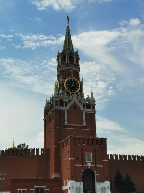 Free Iconic Spasskaya Tower at Kremlin in Moscow, under a bright sky. Architectural landmark. Stock Photo