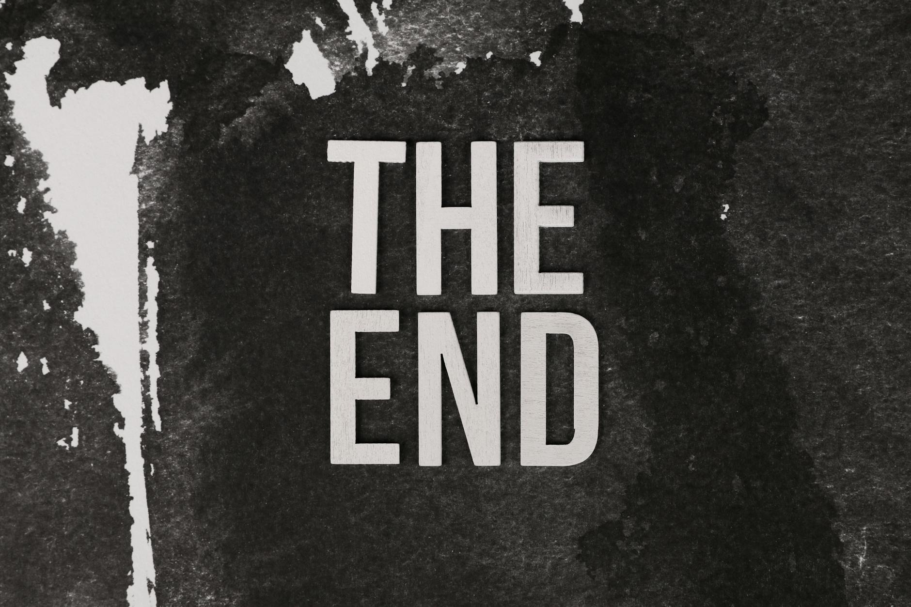 Black and white artistic image featuring 'The End' text with textured background.