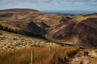 Brown and Green Mountains Under Blue Sky