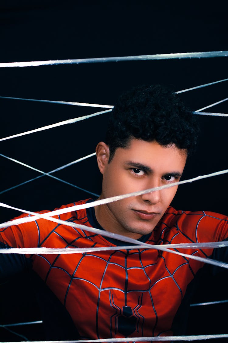 A Man Wearing Spiderman Costume