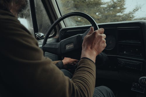 Free A Person Driving a Vehicle  Stock Photo