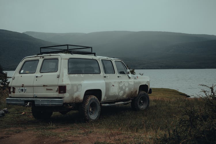 White 4x4 Vehicle Near The Lake