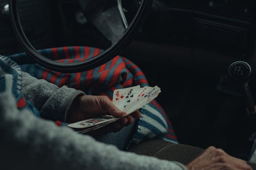 Free A Person Gambling in the Car Stock Photo