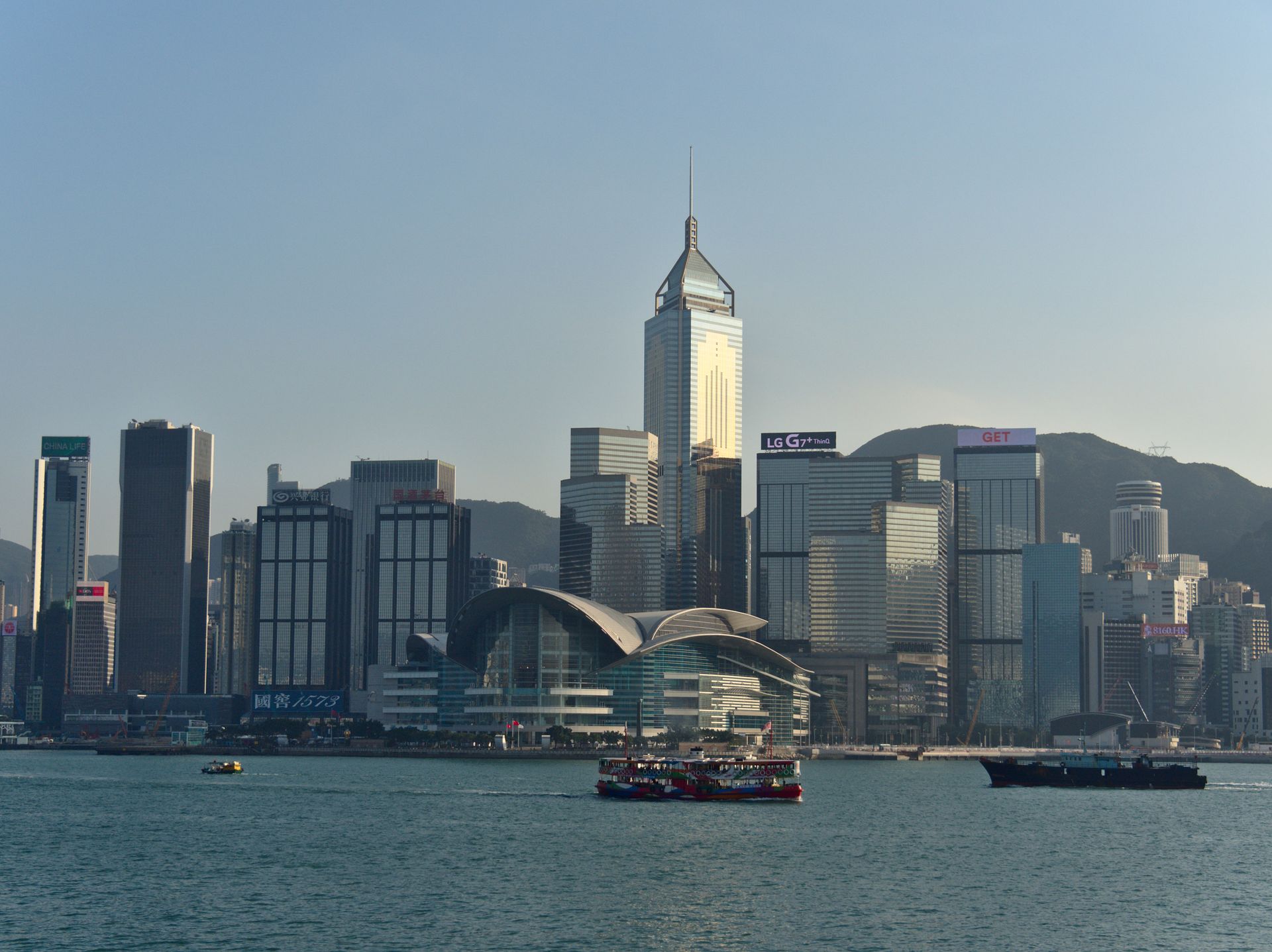 Capture of the iconic Hong Kong skyline featuring modern skyscrapers and Victoria Harbour.