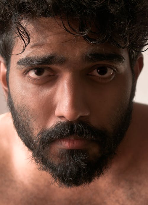 A Close-up Shot of Man's Face with Full Beard