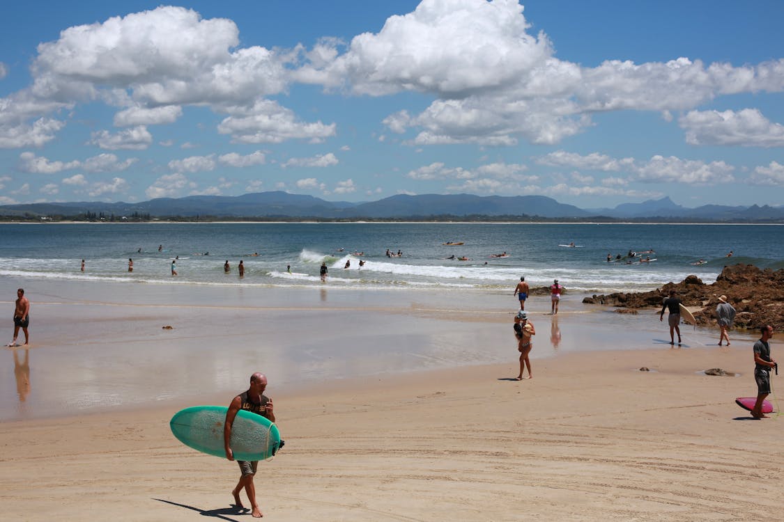 Tourists Enjoying Summer Vacation on a Beach Resort