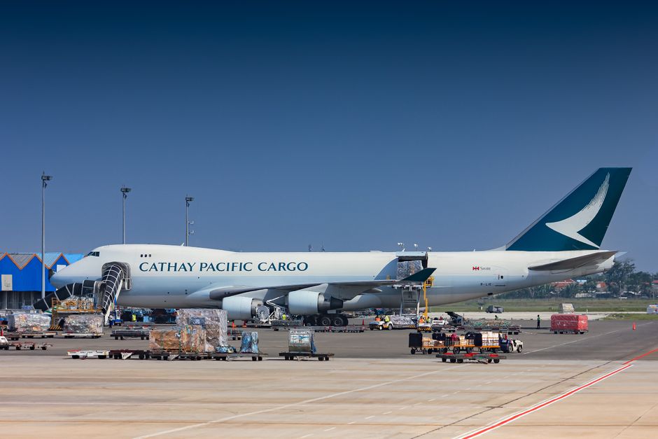 Cathay Pacific Cargo aircraft being loaded at Soekarno-Hatta Airport, Indonesia.