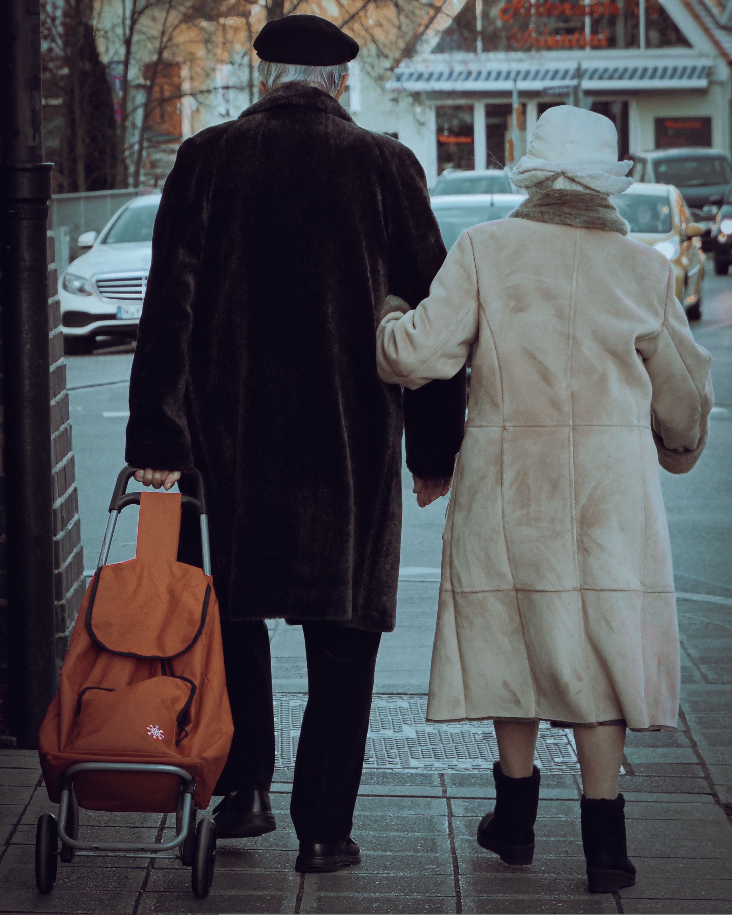 Couple sitting together and talking through a family decision calmly before responding