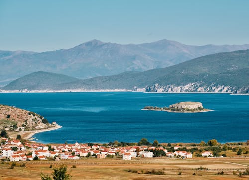 Aerial View of City Near Body of Water