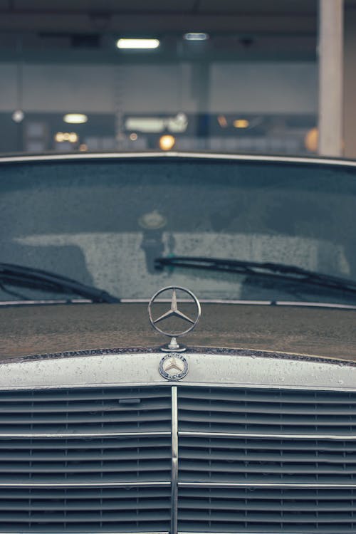 Emblem of A Mercedes Benz Car