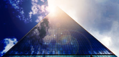 Low Angle Photograph of Pyramid Glass during Calm Weather