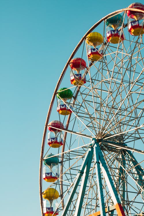 A Ferris Wheel Under a Blue Sky