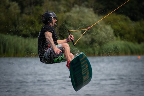 Man in a Black Shirt Wakeboarding