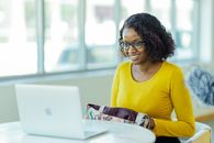 Woman in Yellow Long Sleeve Shirt Wearing Eyeglasses