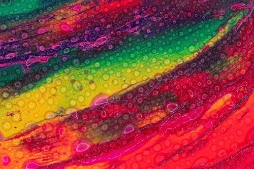 Free Vibrant abstract art featuring bright colors and liquid textures, creating a dynamic pattern. Stock Photo