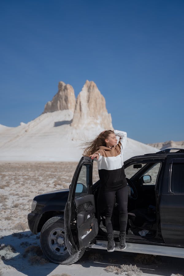 A Woman in a Sports Utility Vehicle