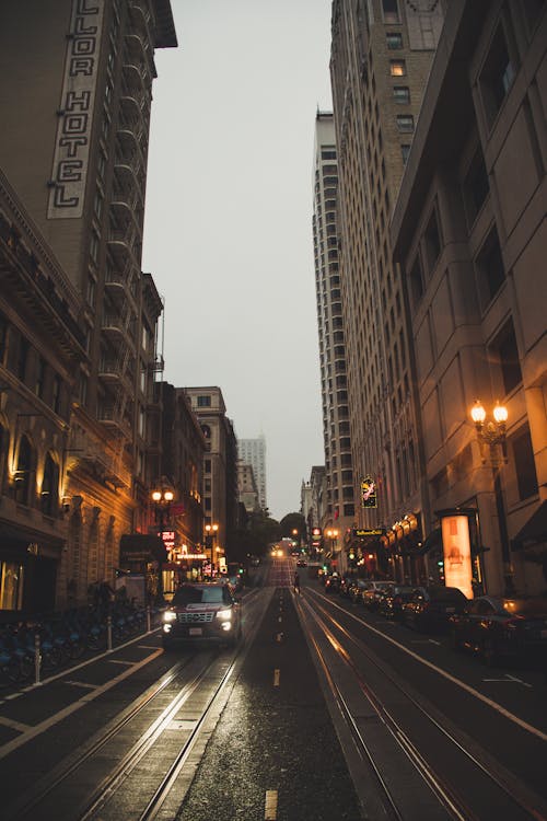 Gray Concrete Buildings Beside Road